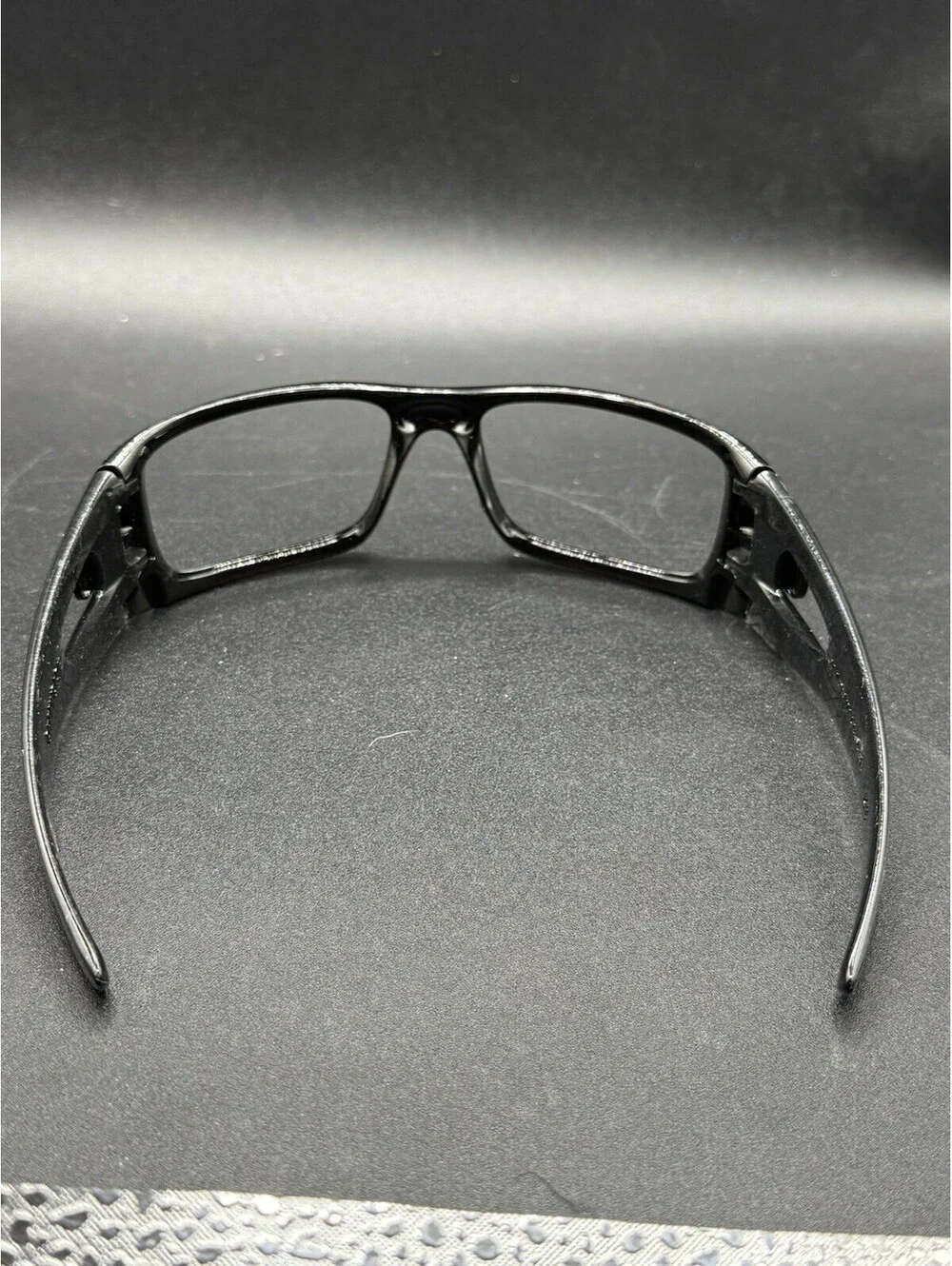Oakley Crankcase Polished Black/Dark Grey History Text Frame (No Icons)